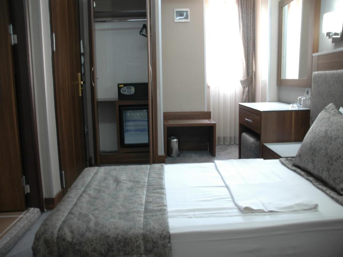 Hotel Buyuk Paris Стамбул Номер фото